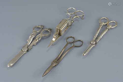 18th / 19th century Silver Plated Candle Snuffer Scissors together with Two Silver Plated Grape Scis