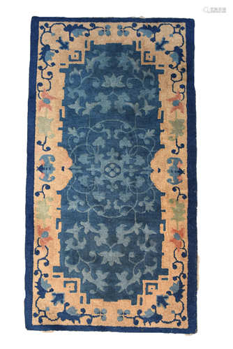 A Chinese 19th century woven blue ground prayer rug