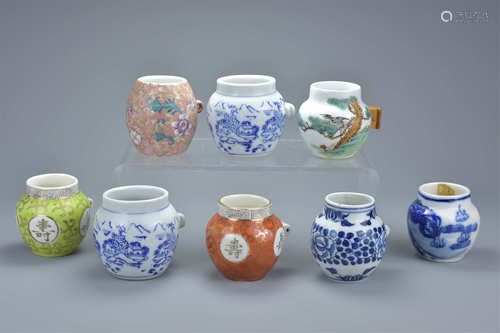 Eight Chinese Early 20th century Porcelain Bird Feeders including Four Blue and White examples and a