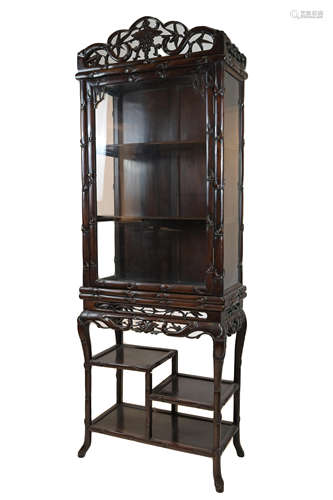 Chinese 19th century Hardwood Cabinet on Stand, the single glazed door opening to reveal two shelves