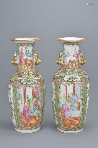 Pair of Early 20th century Chinese Cantonese famille rose porcelain vases, 26cms high (2)