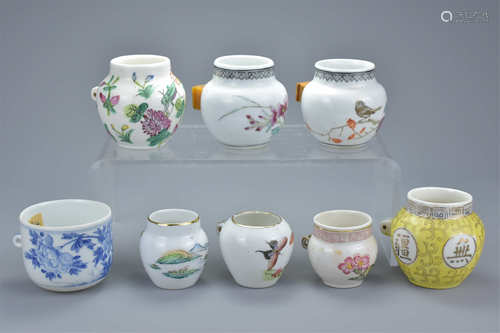 Eight Chinese 20th century Porcelain Bird Feeders, average 6cms high (8)