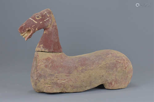 Han Dynasty Seated Horse with a detachable head, 38cms high