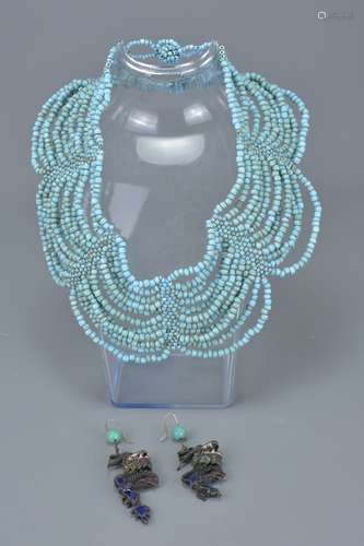 Eleven Strand Turquoise Coloured Bead Necklace together with Pair of Enamelled Metal Drop Earrings i