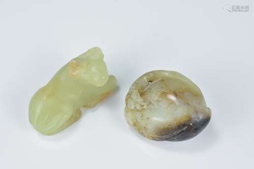 Two Chinese Celadon Jade Carvings in the form of a Cow, 4cms and a Peach Pendant, 3.5cms (2)