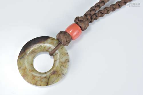 Chinese Polished Jade Disc, 4cms diameter, possibly Ming, on a Later Plaited Necklace