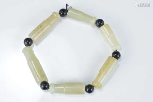 Chinese Six Bead Jade Bracelet in the form of Cheroots, each bead 3.5cms long