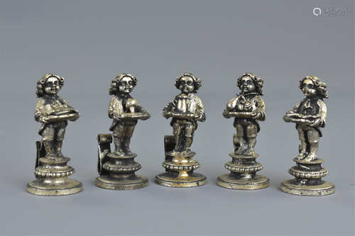 A group of five vintage silver plated name / menu holders in the form of boys serving food dishes.