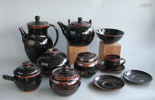 A group of 11 British Studio Pottery – Winchcombe / Sidney Tustin comprising of coffee pot, tea pot,