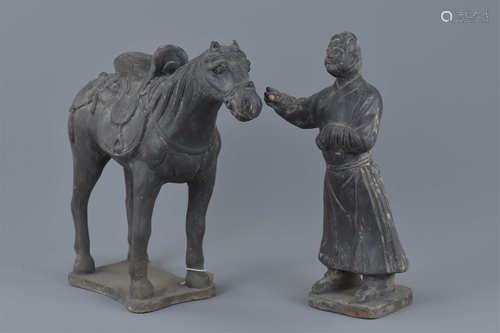 Chinese Yuan Black Pottery Horse and Groom well potted with good detail. The horse has a saddle and