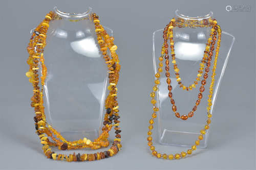 Five strung amber chip bead necklaces. (5)