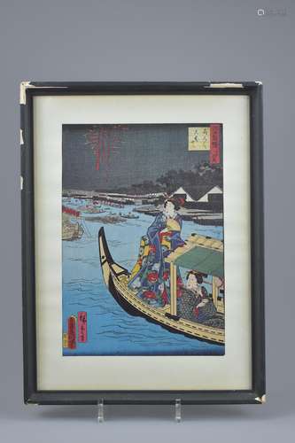 A Japanese framed woodblock print of two Geisha on a boat. Signed. Frame 31.5cm x 42cm