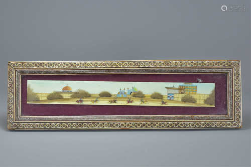 A painted celluloid plaque of Isfahan city, Iran showing polo players. Mounted in frame. Frame 49cm