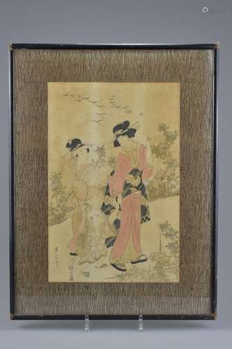 A framed and glazed 19th century Japanese woodblock print by Kikukawa Eizan (1787-1867) of two Geish