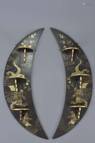 A pair of Chinese early 20th century painted lacquer wall-hangings with folding shelves decorated wi