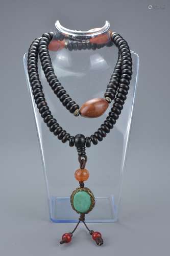 Chinese Zitan Wood with Agate Bead Necklace with Turquoise Pendant, approximately 70cms long