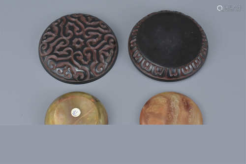 Two Chinese Seal Boxes and Covers, one Agate example, 5.5cms diameter and one Lacquered example, 8cm