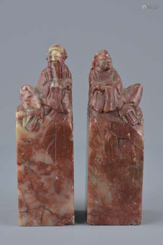 Pair of Chinese Soapstone Seals surmounted by Figures, 11cms high (2)