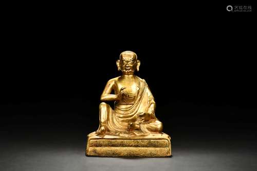 GILT BRONZE SEATED MAHASIDDHA FIGURE