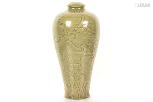 CELADON GLAZED AND IMPRESSED 'DRAGON' VASE