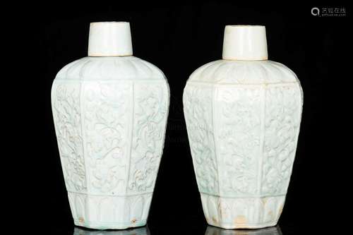 PAIR OF CELADON GLAZED AND CARVED VASES WITH COVERS