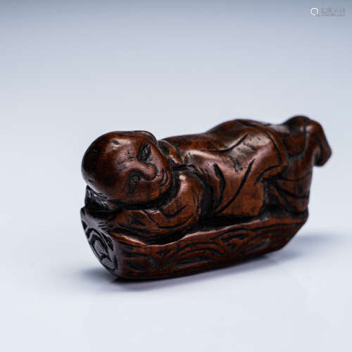 A Chinese Carved Boxwood Figure of Boy