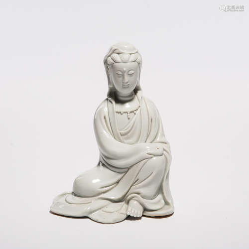 A Chinese White Glazed Porcelain Figure of Buddha