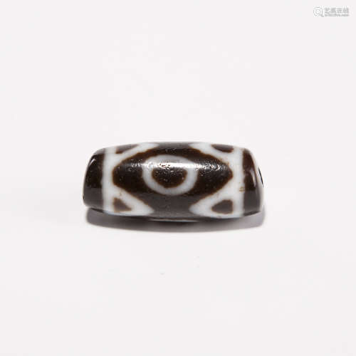 A Chinese Carved Agate DZI Bead