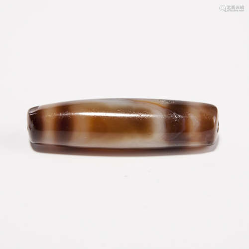 A Chinese Carved Agate DZI Bead