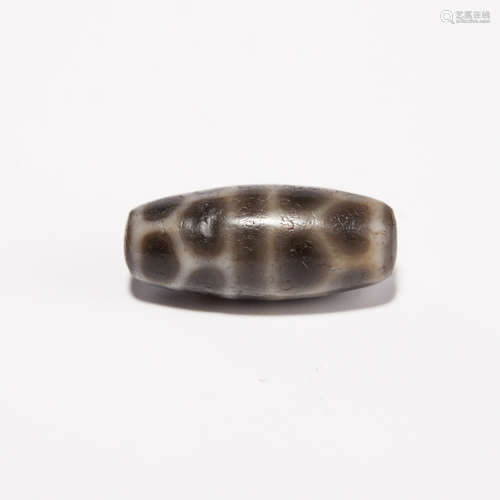 A Chinese Carved Agate DZI Bead