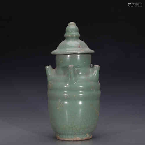 A Chinese Celadon Glazed Porcelain Vase with Cover