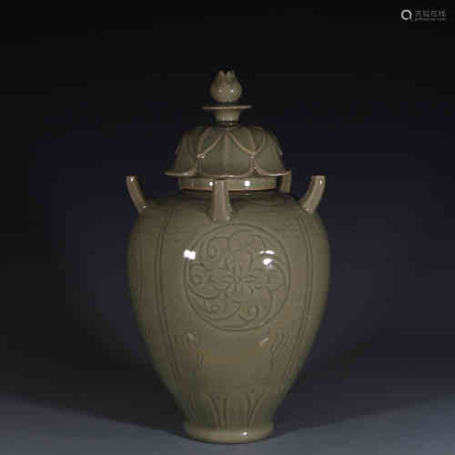 A Chinese Celadon Glazed Porcelain Vase With Cover