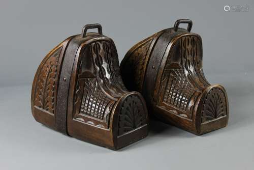 A Pair of 18/19th Century Spanish Stirrups; the ceremonial stirrups decorated with carved patterns, approx 21 x 15 cms