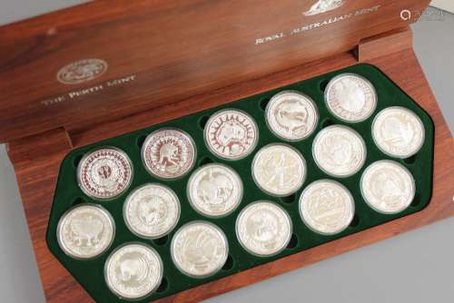 The Sydney 2000 Olympic Silver Coin Collection, in a natural wood presentation box, containing sixteen silver proof coins, complete with the original boxes and sleeves