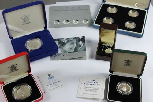 GB Silver Proof Coins, Boxed 50th Anniversary Coronation 50p Proof Set; 2004 United Kingdom Pattern Set (boxed); Golden Wedding Anniversary silver proof crown; 1994 £2 silver proof coin and a 1997; 2006 £5 proof coin; 20 pence silver coin and chain, approx 117