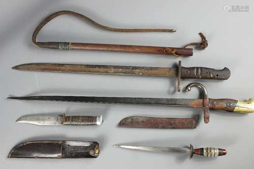 Bayonets and Knives, including a brass-handled bayonet engraved RQ 28264 Paris Foundry 1881 approx 49 cms; WWI Bayonet stamped 1917 W approx 42 cms, a double-edged blade approx 19 cms and a Ventu single-edged blade together with a vintage bullwhip