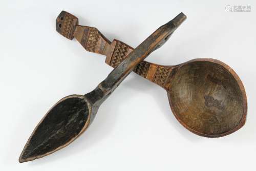 A Carved Pointed Wooden Ladle; the ladle possibly Native American with another carved  African ladle