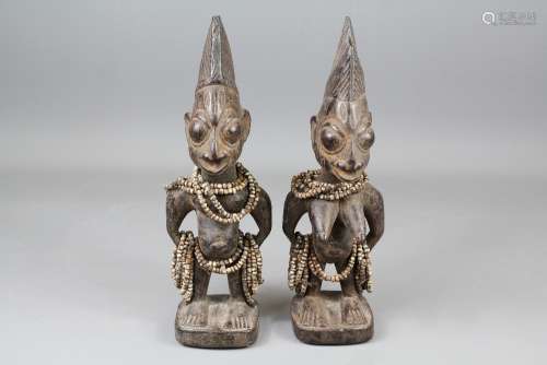 Pair of Ibeji (Twin) Carved Figures from the Yoruba region of West Africa, approx 29 cms h