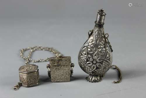 An Indo-Persian Small White-metal Bottle; the bottle decorated approx 10 cms h, together with a pot and container on chain