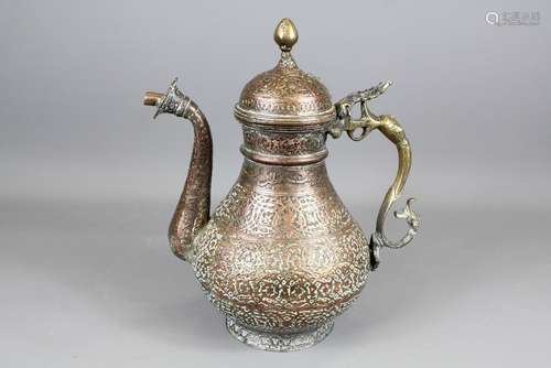 Antique Islamic Copper Ewer; the ewer having Islamic script to the body, arabesque design to the body, cover and spout, with a zoo-form handle, approx 31 cms h