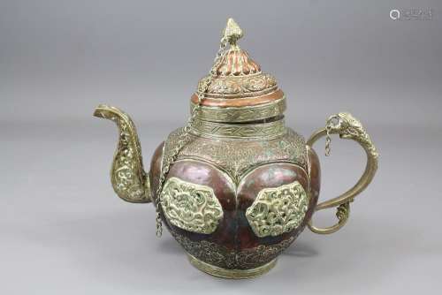 Antique Tibetan Copper Teapot, having a zoo-form handle, with raised decorative brass plaques to body depicting Buddhist symbolism, approx 20 cms