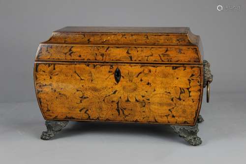 Regency Penwork Double Tea Caddy, raised on bronze claw feet, the lid opens to reveal double compartments for green and black tea centered with a compartment for a mixing bowl, intricately decorated with a foliate design, the interior decorated with South Asian scenes, approx 36 w x 24 cms