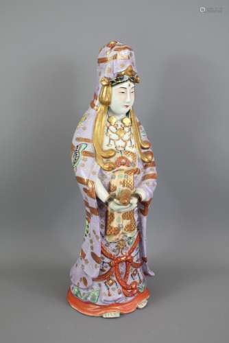 An Early 20th Century Chinese Porcelain Figure of  Lady; the hand-painted figure wearing a garment profusely painted with butterflies, she is depicted standing clasping a scroll, approx 38 cms h
