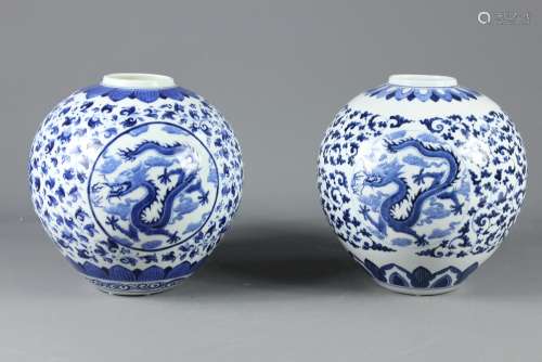 Two 20th Century Blue and White Chinese Ginger Jars; the jars depicting chasing dragons, character marks to base, approx  23 cms h