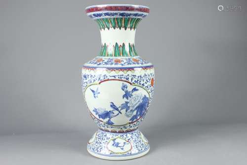 20th Century Chinese Blue and White Ceramic Vase; the vase having two panels depicting birds and roses, green acanthus leaf design, approx 44 cms h