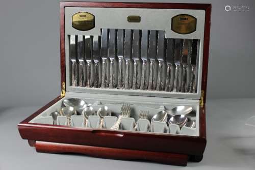 A Viners Silver-plated Canteen of Cutlery; the 58-piece cutlery set in the original presentation box comprises eight table knives, eight table forks, eight dessert knives, eight dessert forks, eight dessert spoons, eight teaspoons, two table spoons and eight soup spoons