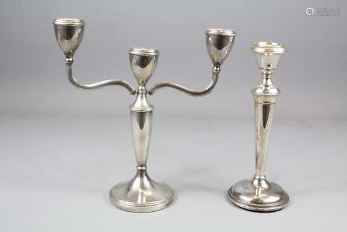 A Silver Candelabra, Birmingham hallmark dated 1969 approx 22 cms h, approx 388 gms together with a silver candlestick approx 20 cms h, marks rubbed