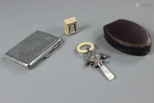 Miscellaneous Silver, this lot includes a silver card case engraved and initialled Birmingham hallmark, dated 1924, together with a silver and mother of pearl handled Teething Ring and Rattle, Birmingham hallmark 1887 together with a Charles Horner thimble