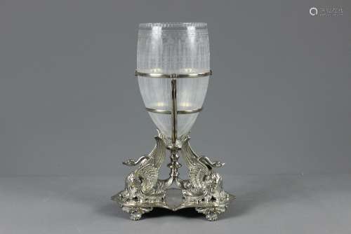 A 19th Century Silver Plate and Cut Glass Epergne; having swan supports and original glass liner, approx 32