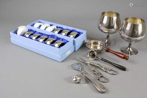 Miscellaneous Silver and Silver Plate - comprising two Newbridge silver plated napkin rings (as new), napkin ring, shell-shape pill box, Arthur Price tea strainer, grape shears, bottle opener, pastry servers together with two silver plate brandy goblets together with a silver brandy warmer Birmingham hallmark, mm LJM and a silver napkin ring Birmingham hallmark B & Co